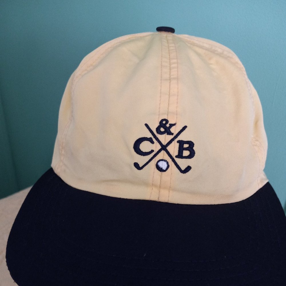 cutter and buck yellow cap with leather adjustable band pre-owned